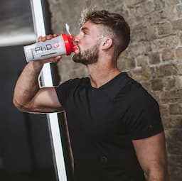 man drinking protien